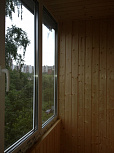 Балкон с отделкой деревом - фото 1